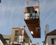 Crane Moving LivingHome Into Place | Credit - LivingHomes